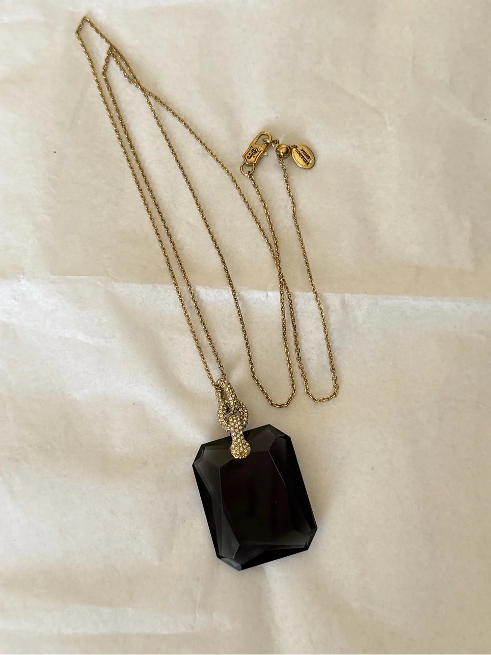 Juicy Couture gold tone